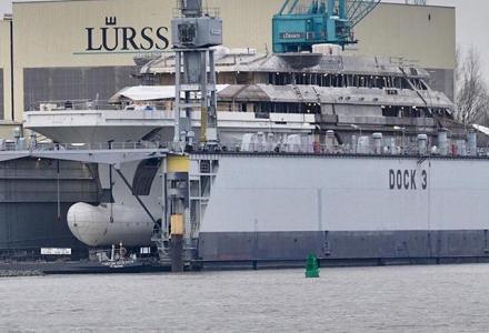 142m Lurssen Project Redwood moved to floating dock